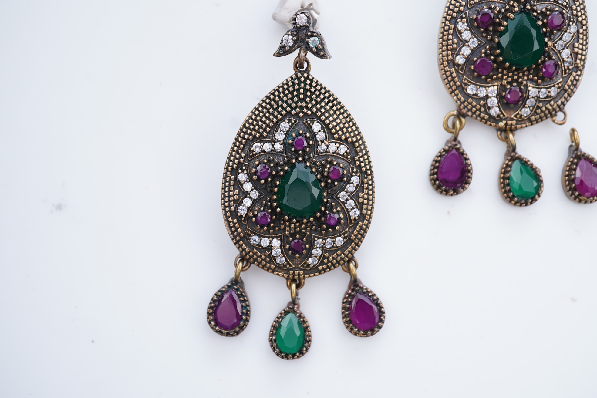 A pair of gem-set and diamond earrings